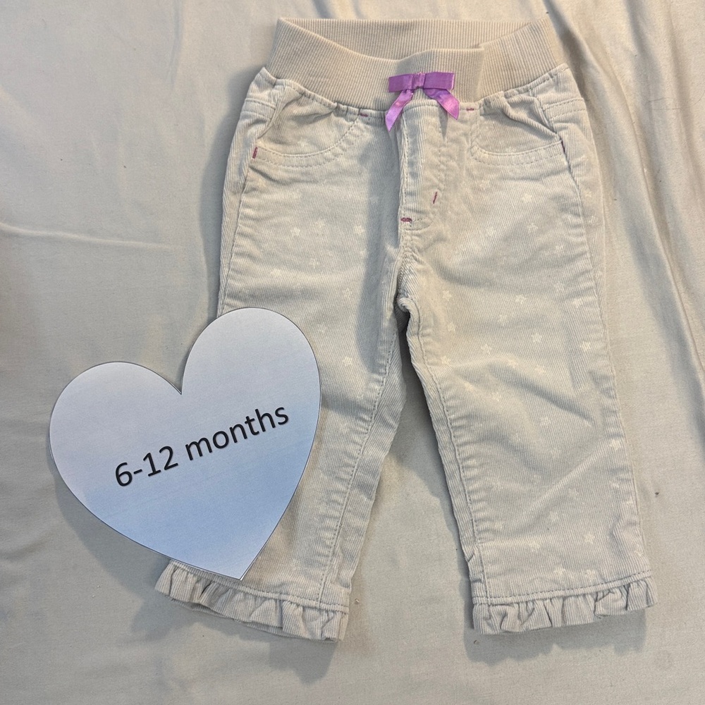 Gymboree - NWOT - pull on corduroy pants with star pattern.  Size 6-12 months
